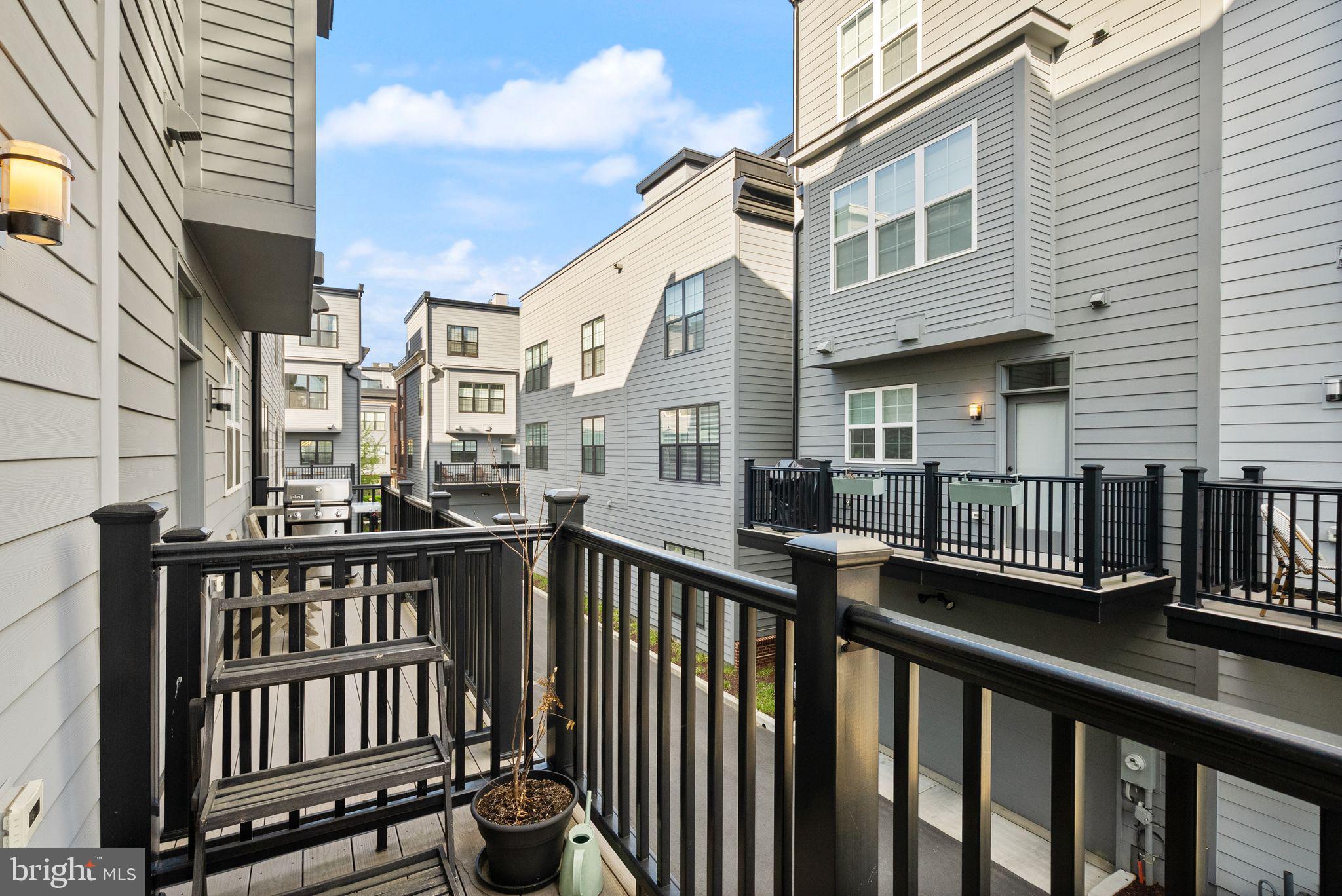 11258 Faraday Park Drive Reston, VA 20190 - Photo 18 of 44 a view of a brick building from a balcony
