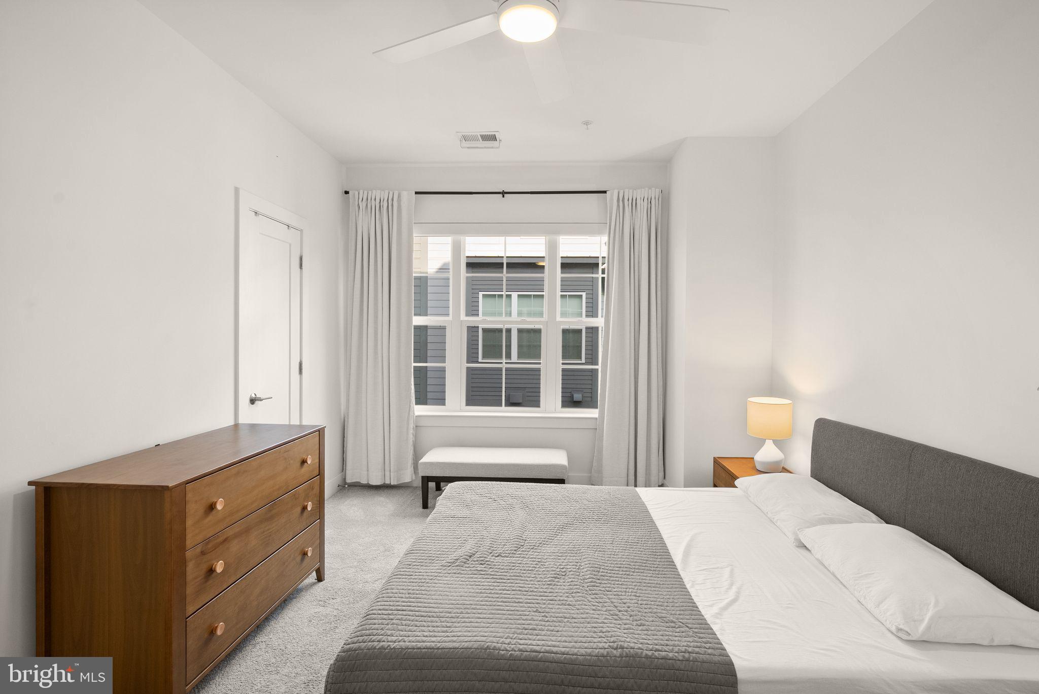 11258 Faraday Park Drive Reston, VA 20190 - Photo 22 of 44 a bedroom with a bed and window