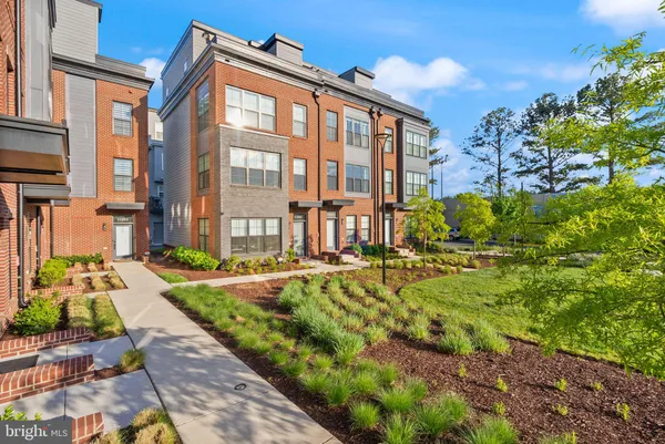 a view of a building with a yard