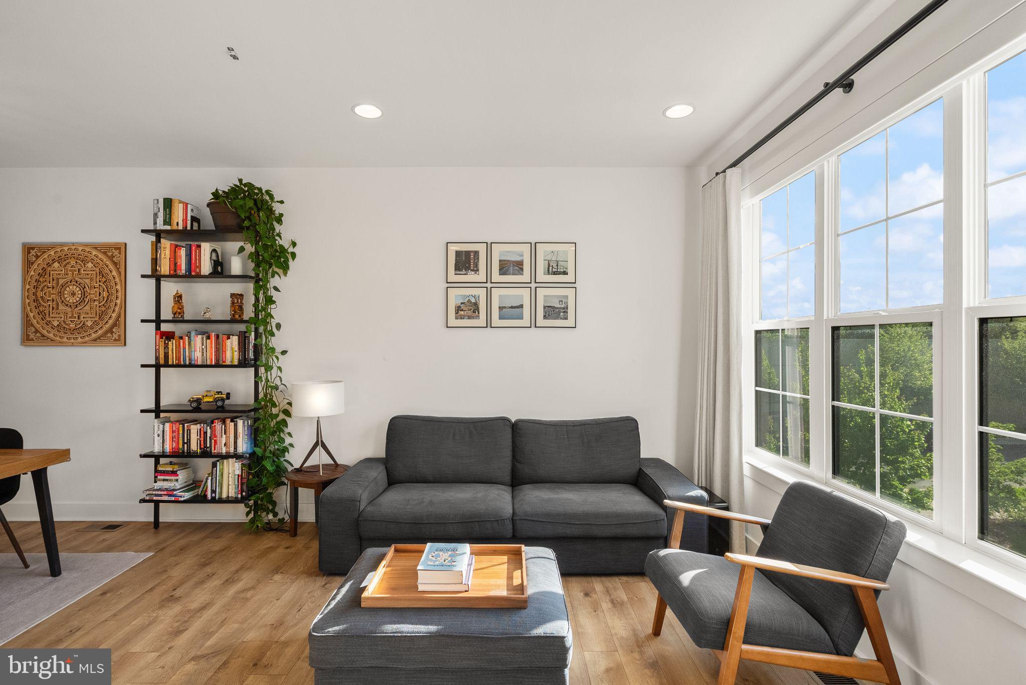 11258 Faraday Park Drive Reston, VA 20190 - Photo 8 of 44 a living room with furniture and a large window