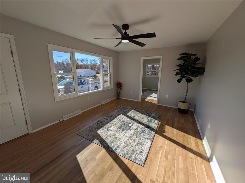 7183 Oak Drive Reva, VA 22735 - Photo 5 of 6 a bedroom with a bed and a window