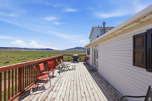 830 North Stone Road Snowville, UT 84336 - Photo 64 of 69 Deck with area for grilling and a mountain view
