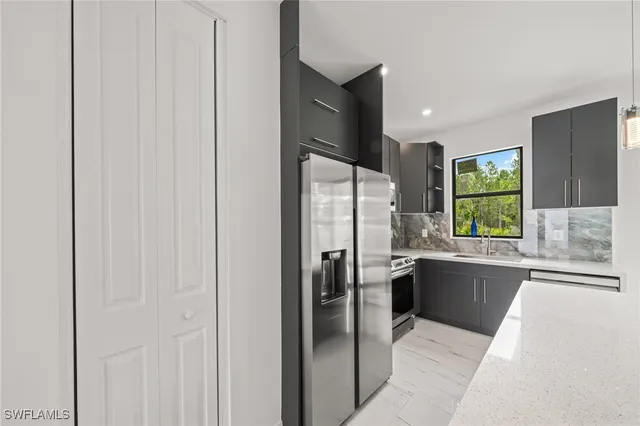 a bathroom with a bathtub and a sink