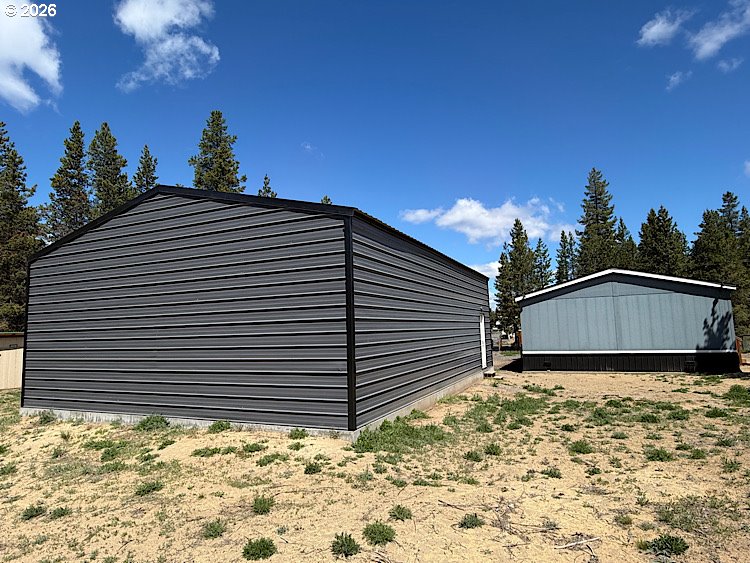 16125 Hawks Lair Road La Pine, OR 97739 - Photo 28 of 35 a view of a house with a yard