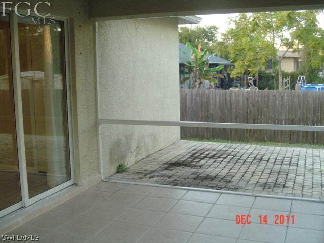 18425 Lee Road Fort Myers, FL 33967 - Photo 8 of 9 a view of a wrought fence