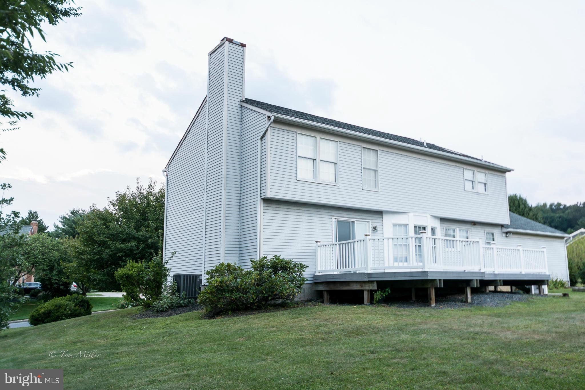 910 Metfield Road Baltimore, MD 21286 - Photo 2 of 22 a view of a house with backyard