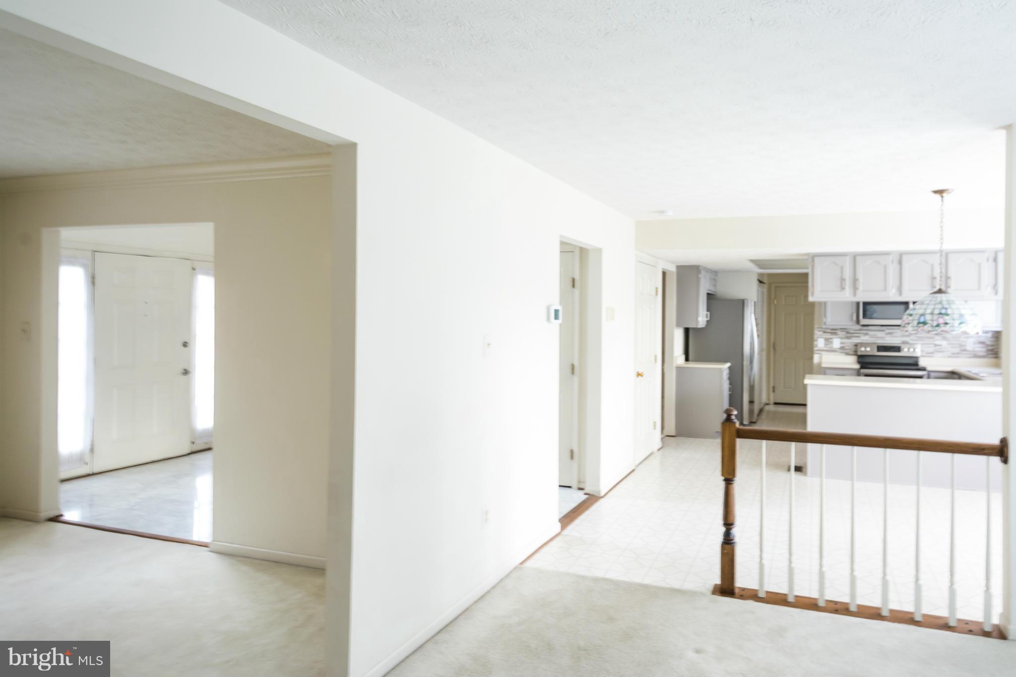 910 Metfield Road Baltimore, MD 21286 - Photo 22 of 22 a view of a kitchen from the hallway