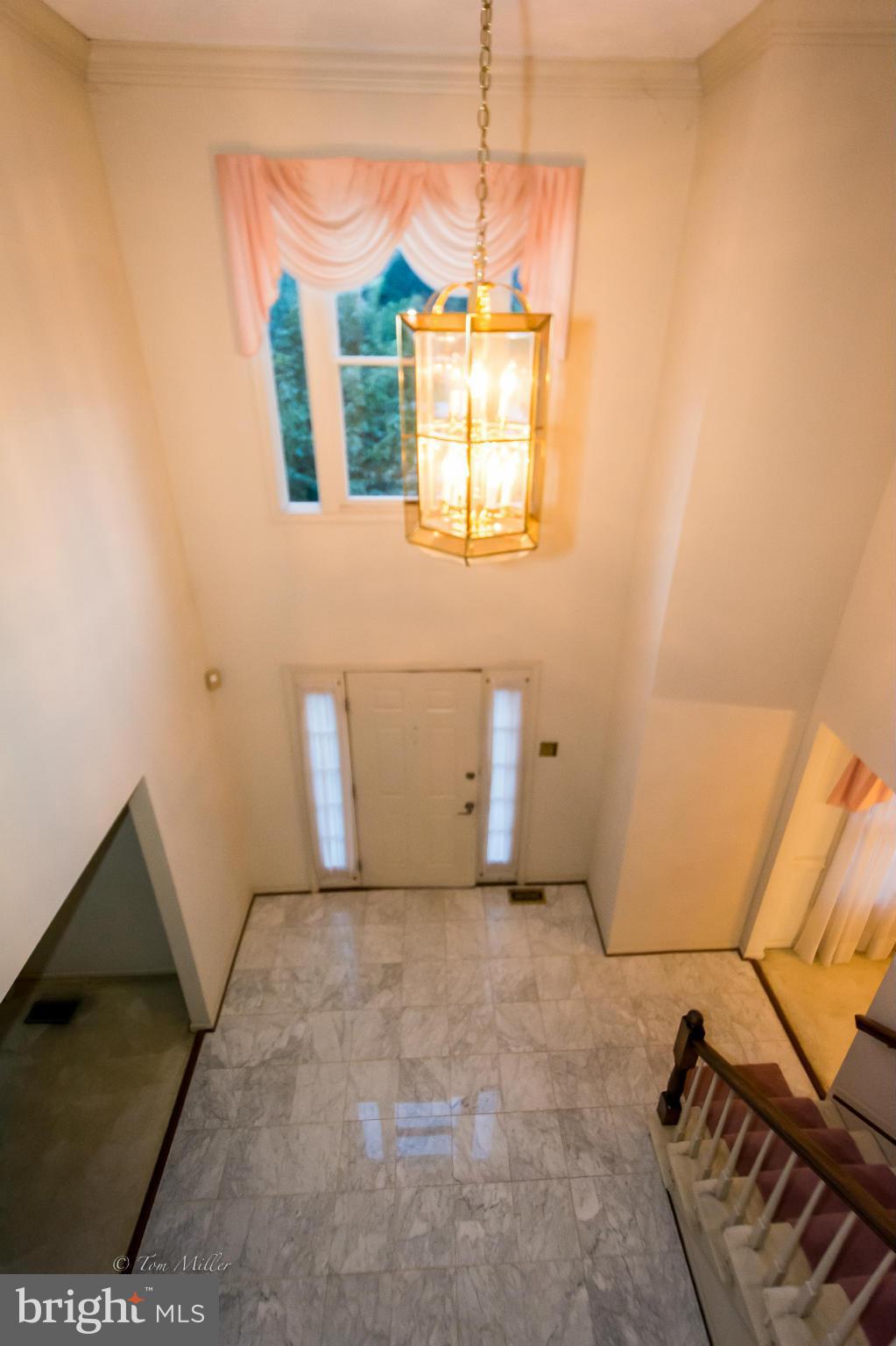 910 Metfield Road Baltimore, MD 21286 - Photo 10 of 22 a view of an empty room with a window