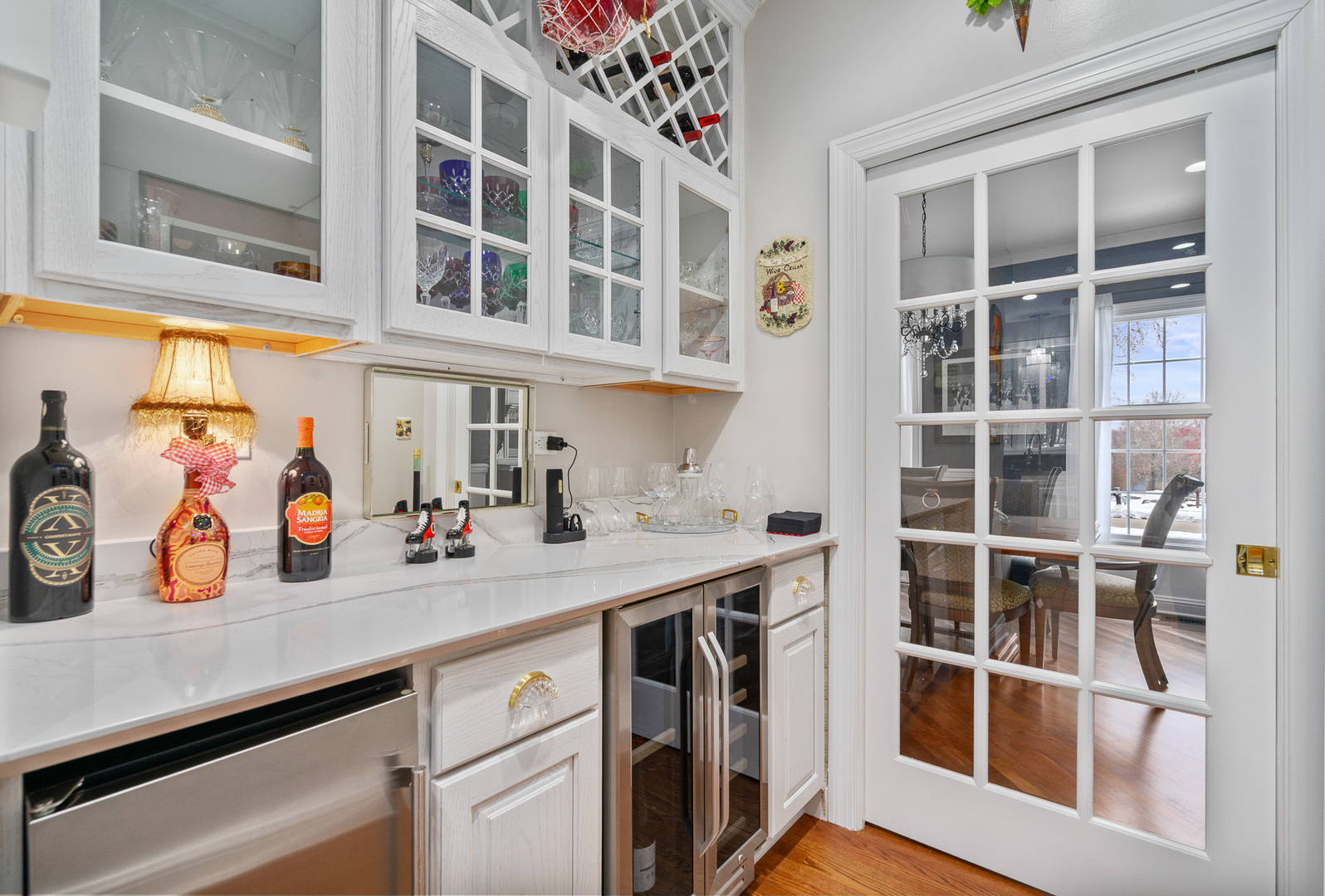 19427 Hunter Trail Mokena, IL 60448 - Photo 11 of 72 a view of a kitchen area with furniture and wooden floor