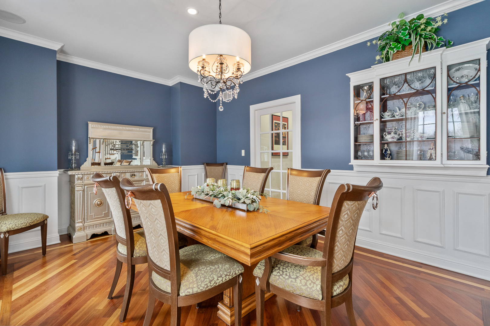 19427 Hunter Trail Mokena, IL 60448 - Photo 22 of 72 a view of a dining room with furniture wooden floor and chandelier
