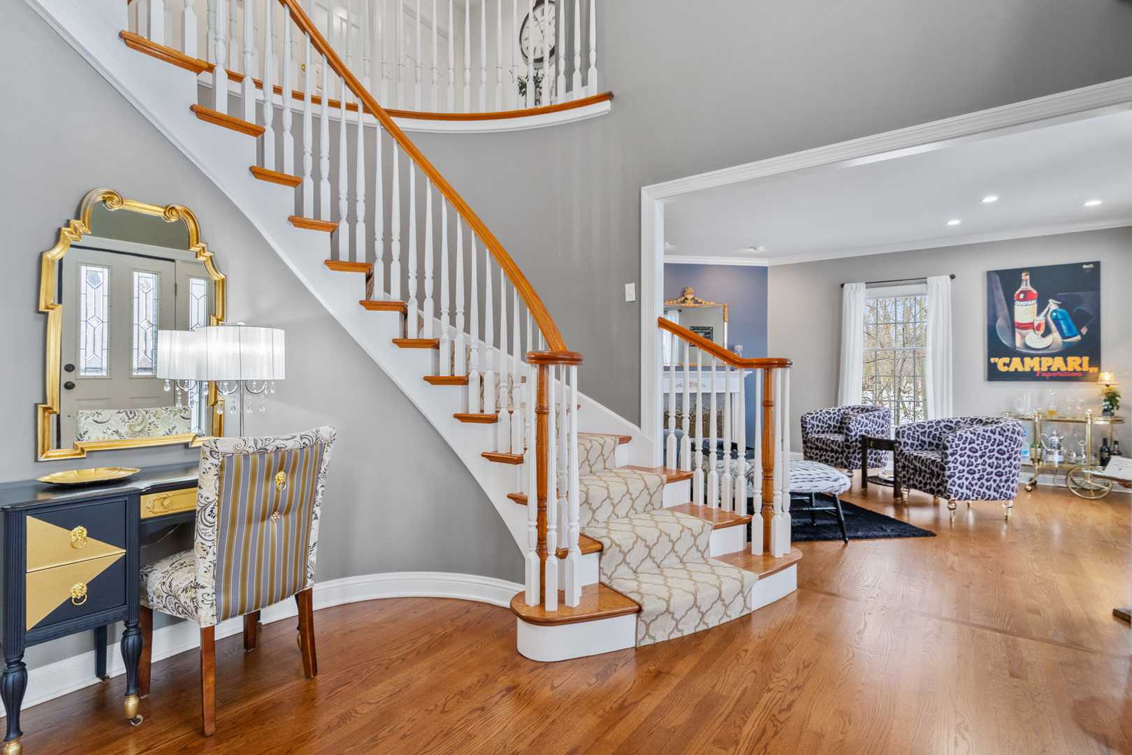 19427 Hunter Trail Mokena, IL 60448 - Photo 25 of 72 a view of entryway livingroom and hall with wooden floor