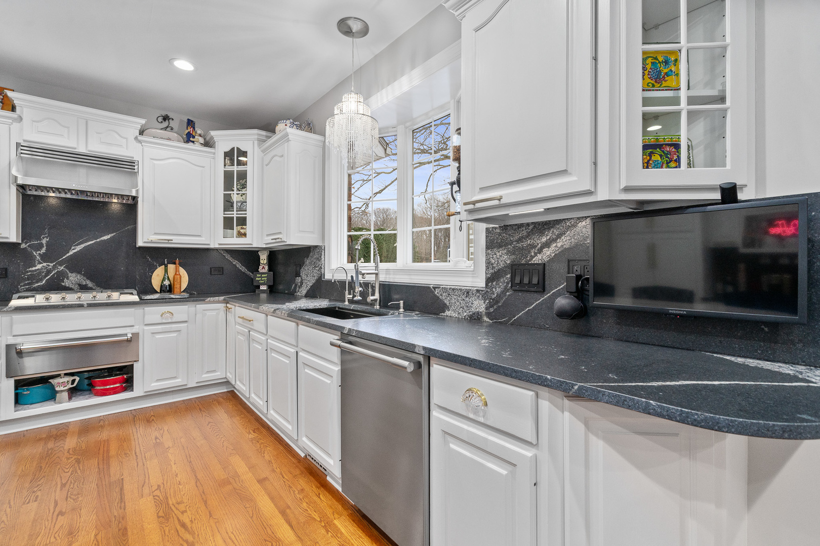 19427 Hunter Trail Mokena, IL 60448 - Photo 7 of 72 a kitchen with stainless steel appliances a stove a sink and a microwave