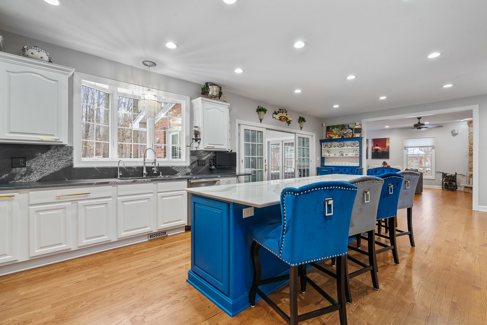 19427 Hunter Trail Mokena, IL 60448 - Photo 9 of 72 a kitchen with stainless steel appliances granite countertop a table chairs sink refrigerator and cabinets