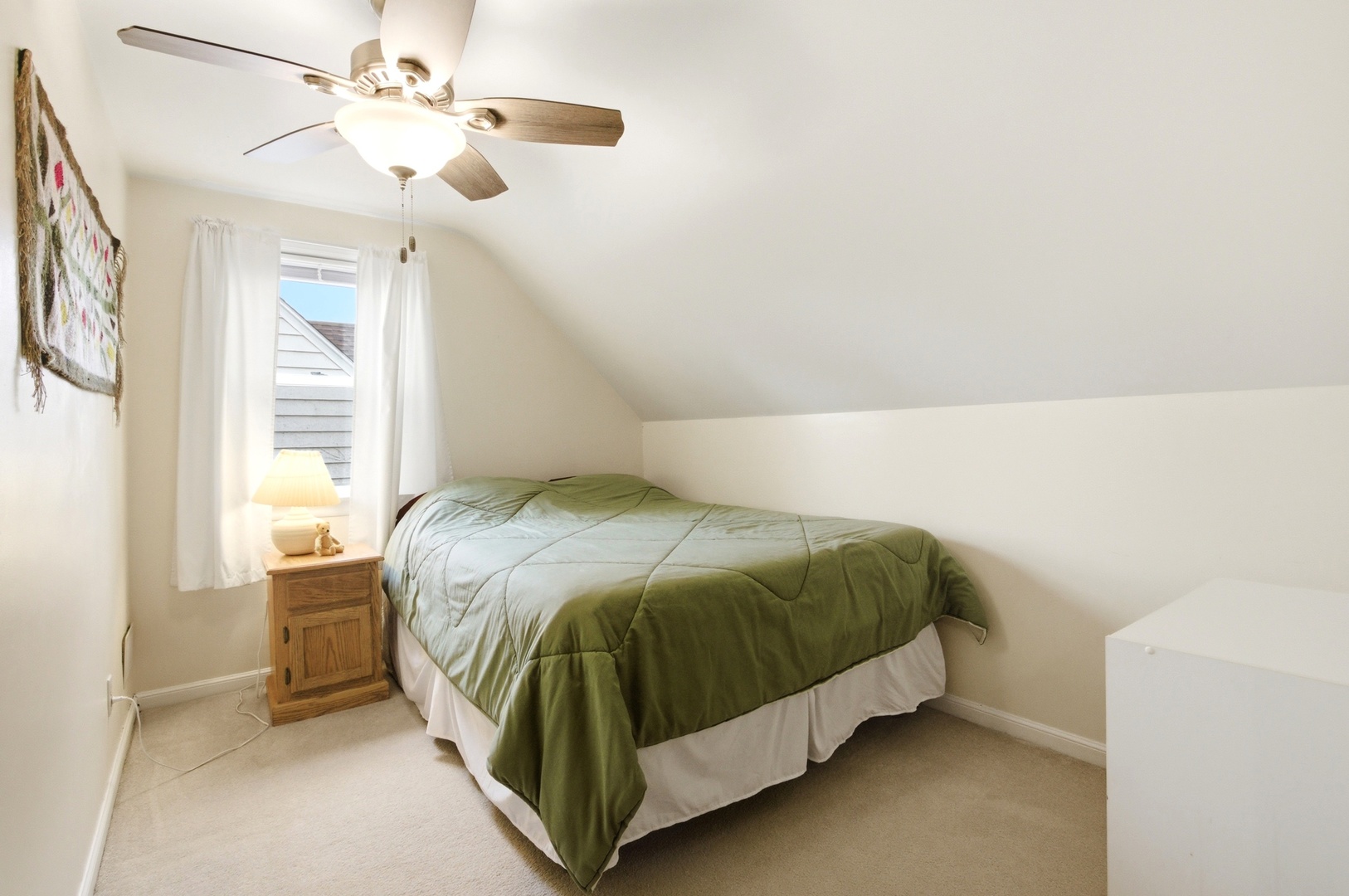 221 South Michigan Avenue Addison, IL 60101 - Photo 17 of 25 a bed sitting in a bedroom next to a window