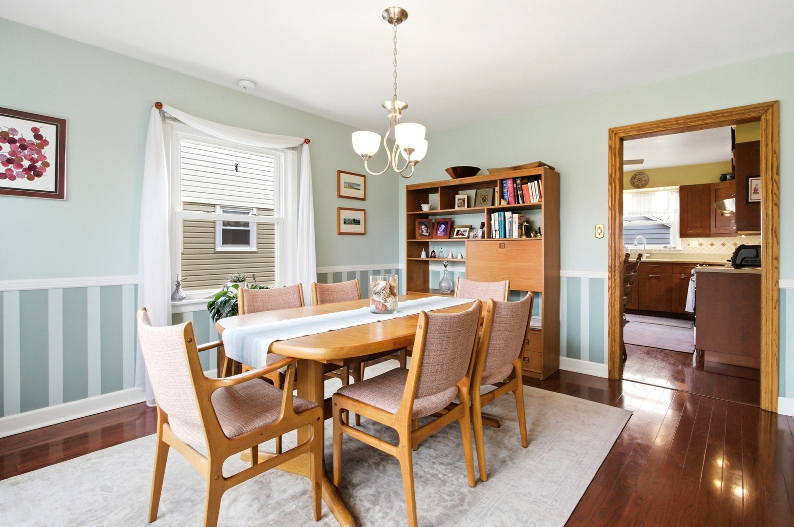 221 South Michigan Avenue Addison, IL 60101 - Photo 7 of 25 a view of a dining room with furniture window and wooden floor