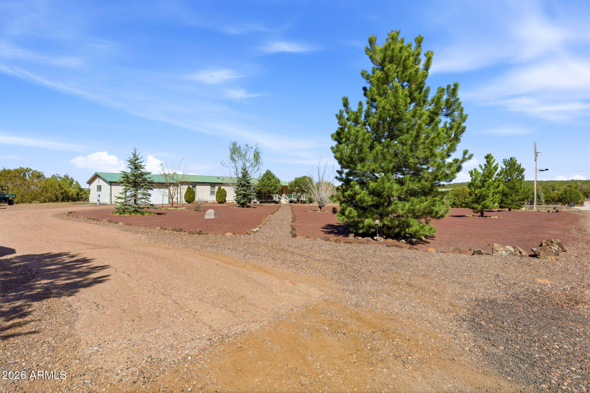 5 County Road Concho, AZ 85924 - Photo 2 of 35 a view of a road with a building in the background