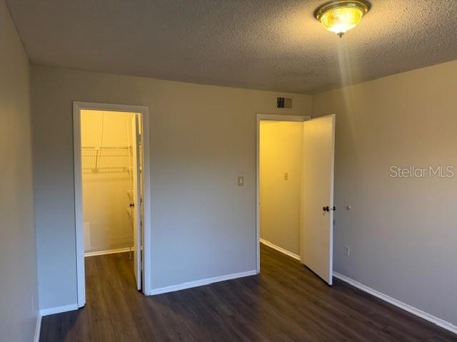 7309 Abonado Road, Unit 7309 Tampa, FL 33615 - Photo 14 of 17 a view of empty room with wooden floor
