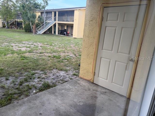 7309 Abonado Road, Unit 7309 Tampa, FL 33615 - Photo 17 of 17 a view of a house with a yard