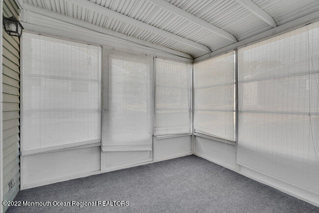 28 Churchill Road, Unit 71 Whiting, NJ 08759 - Photo 21 of 28 Enclosed Porch