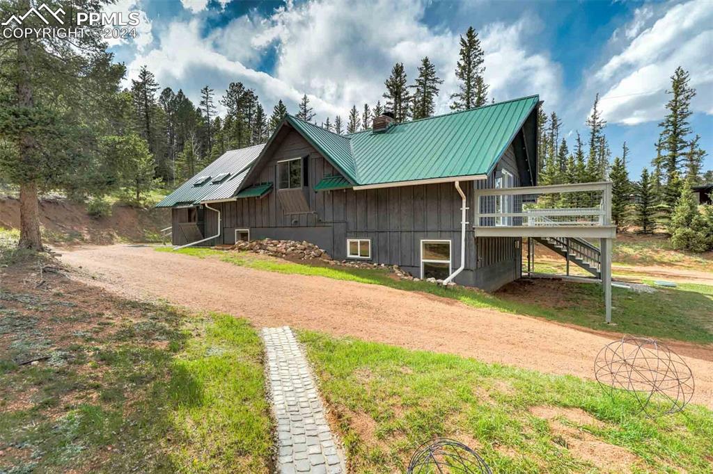 1699 Spring Valley Drive Divide, CO 80814 - Photo 35 of 44 a house view with a garden space