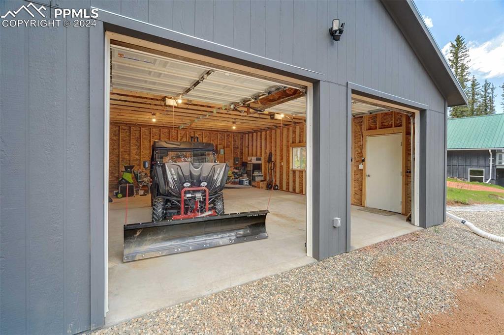 1699 Spring Valley Drive Divide, CO 80814 - Photo 43 of 44 a view of a hallway with a couch and a window
