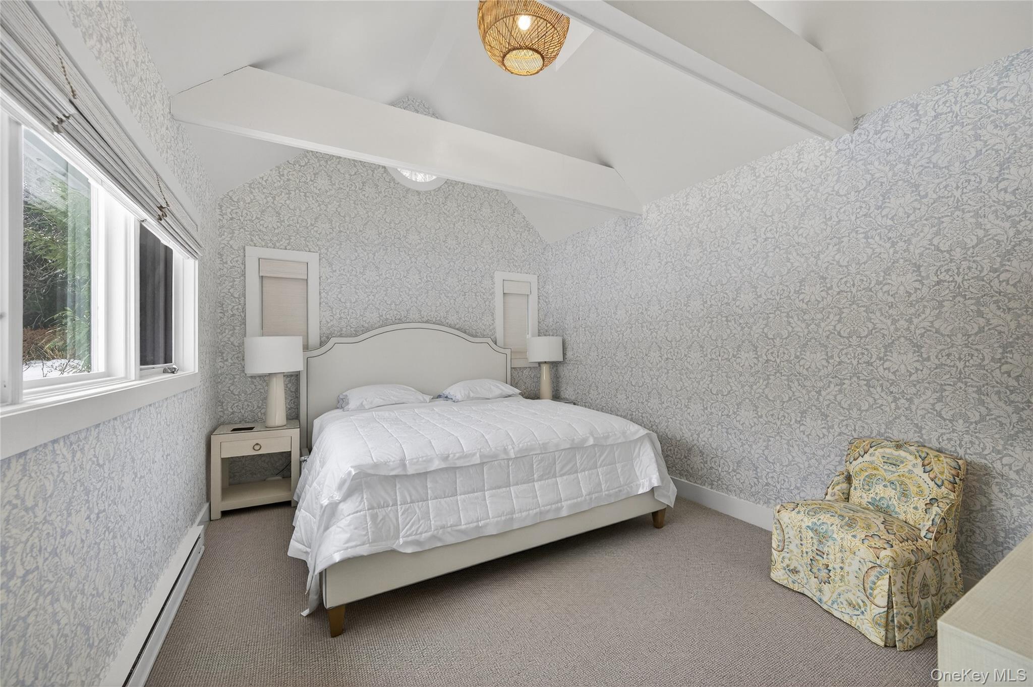 343 Chicken Valley Road Glen Head, NY 11545 - Photo 37 of 49 a bedroom with a bed and window