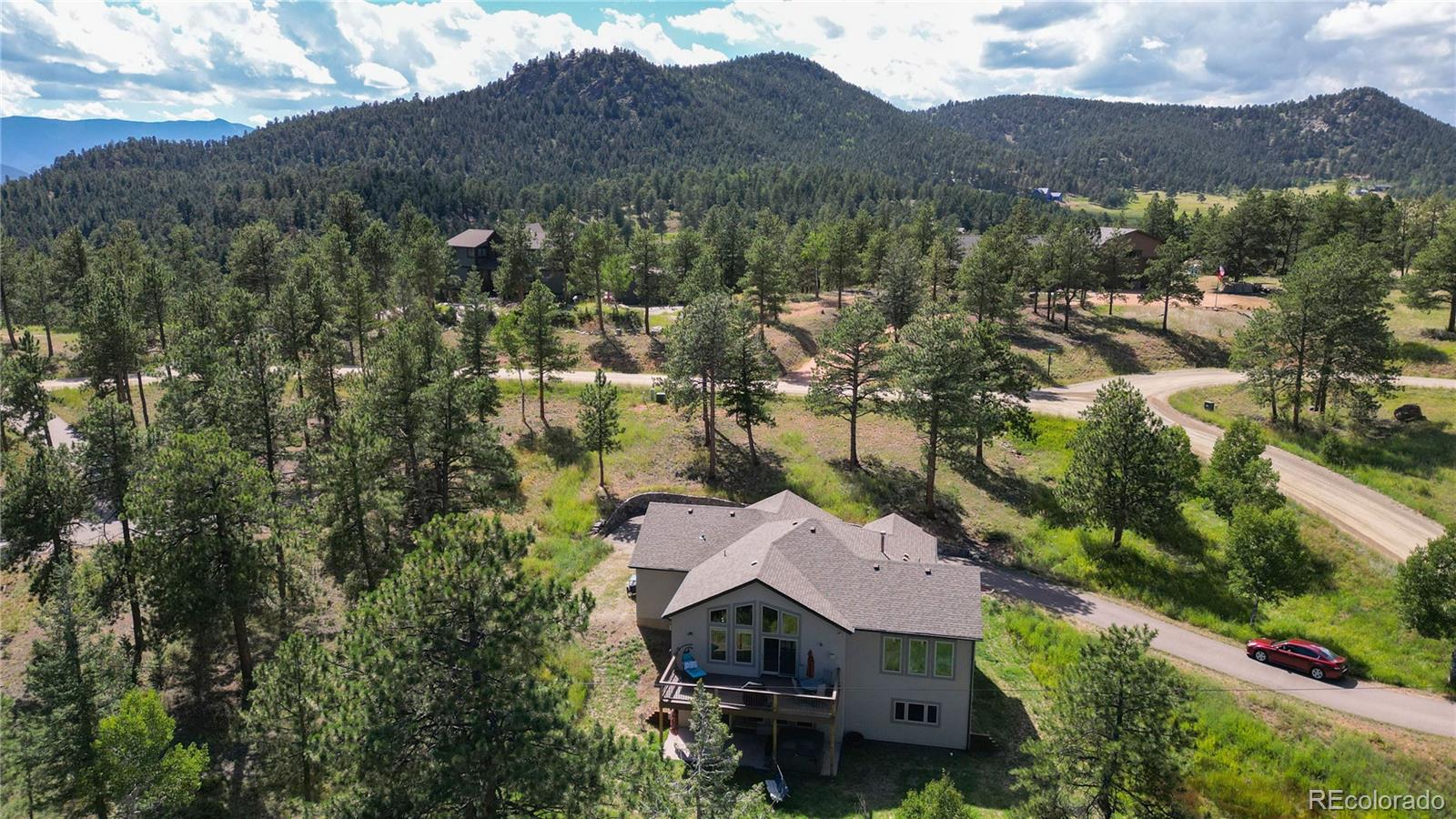 230 Mohawk Trail Pine, CO 80470 - Photo 12 of 39 an aerial view of houses with a street