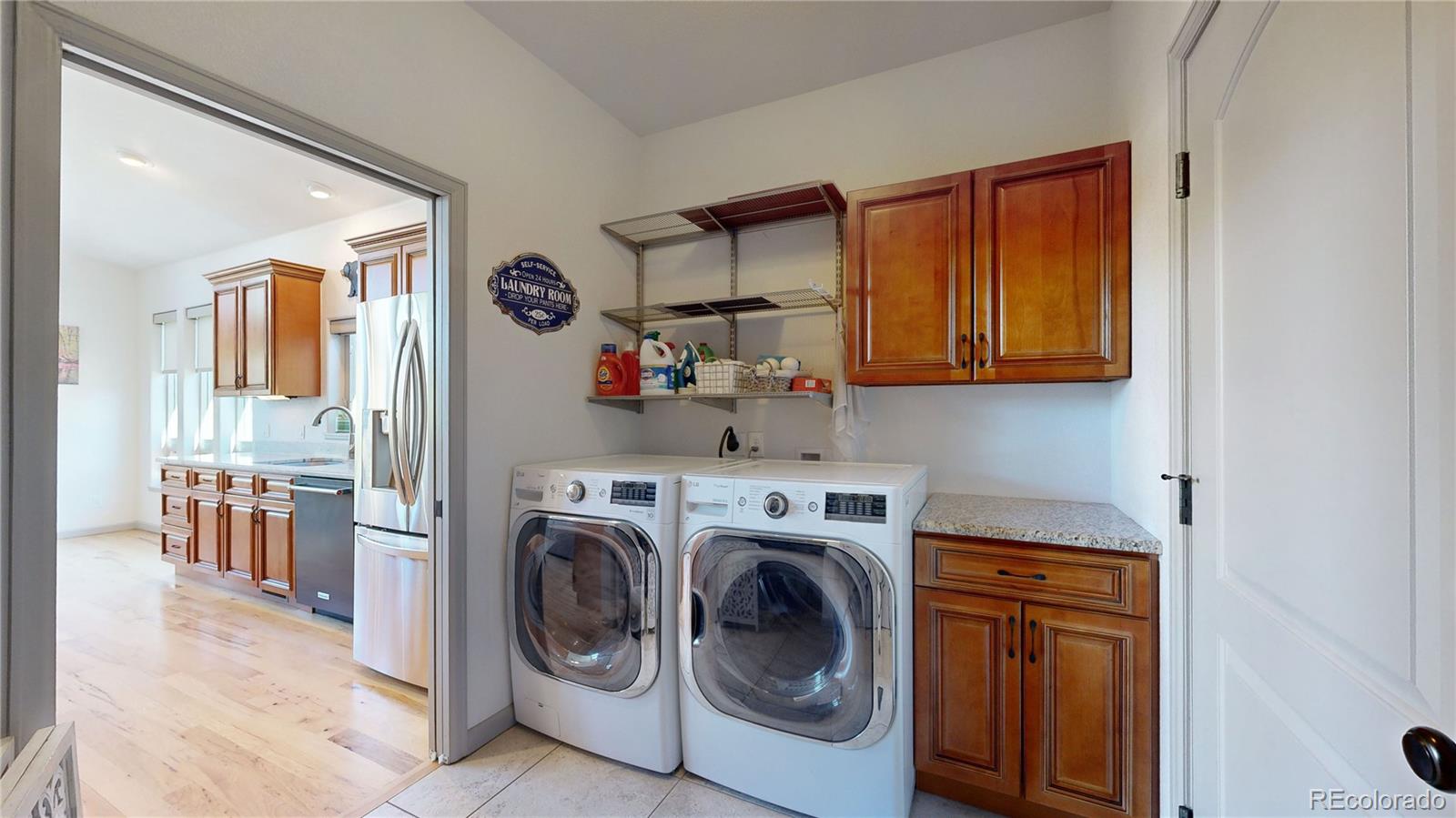 230 Mohawk Trail Pine, CO 80470 - Photo 25 of 39 a view of a storage and utility room with washer and dryer