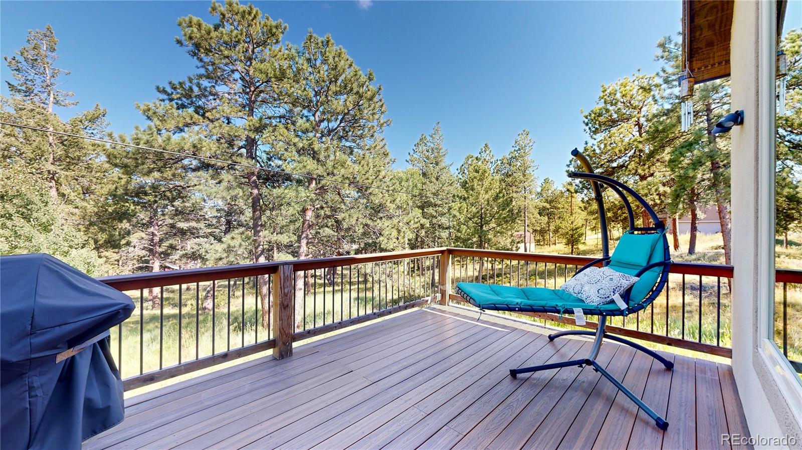 230 Mohawk Trail Pine, CO 80470 - Photo 30 of 39 a view of a chairs on the roof deck