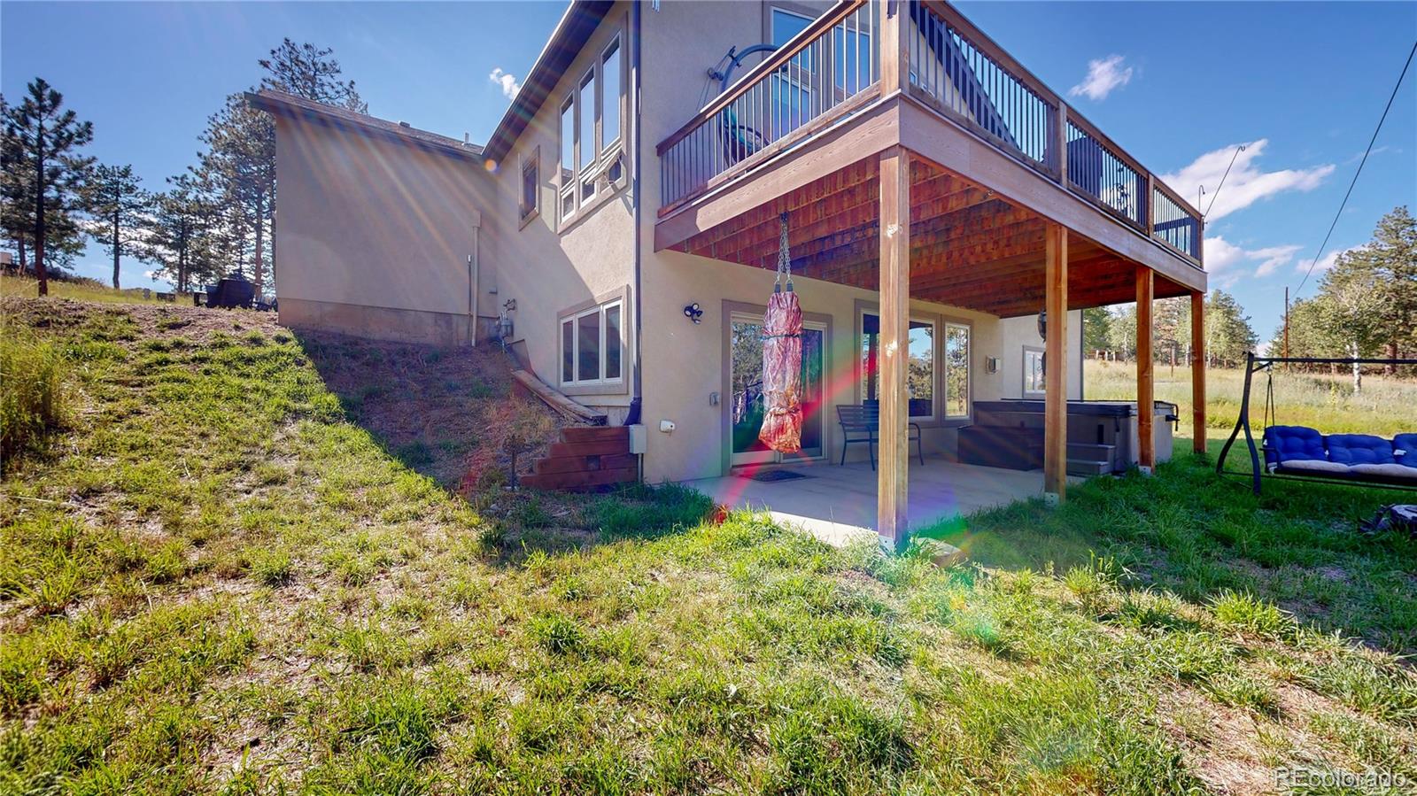 230 Mohawk Trail Pine, CO 80470 - Photo 31 of 39 a view of a house with a yard
