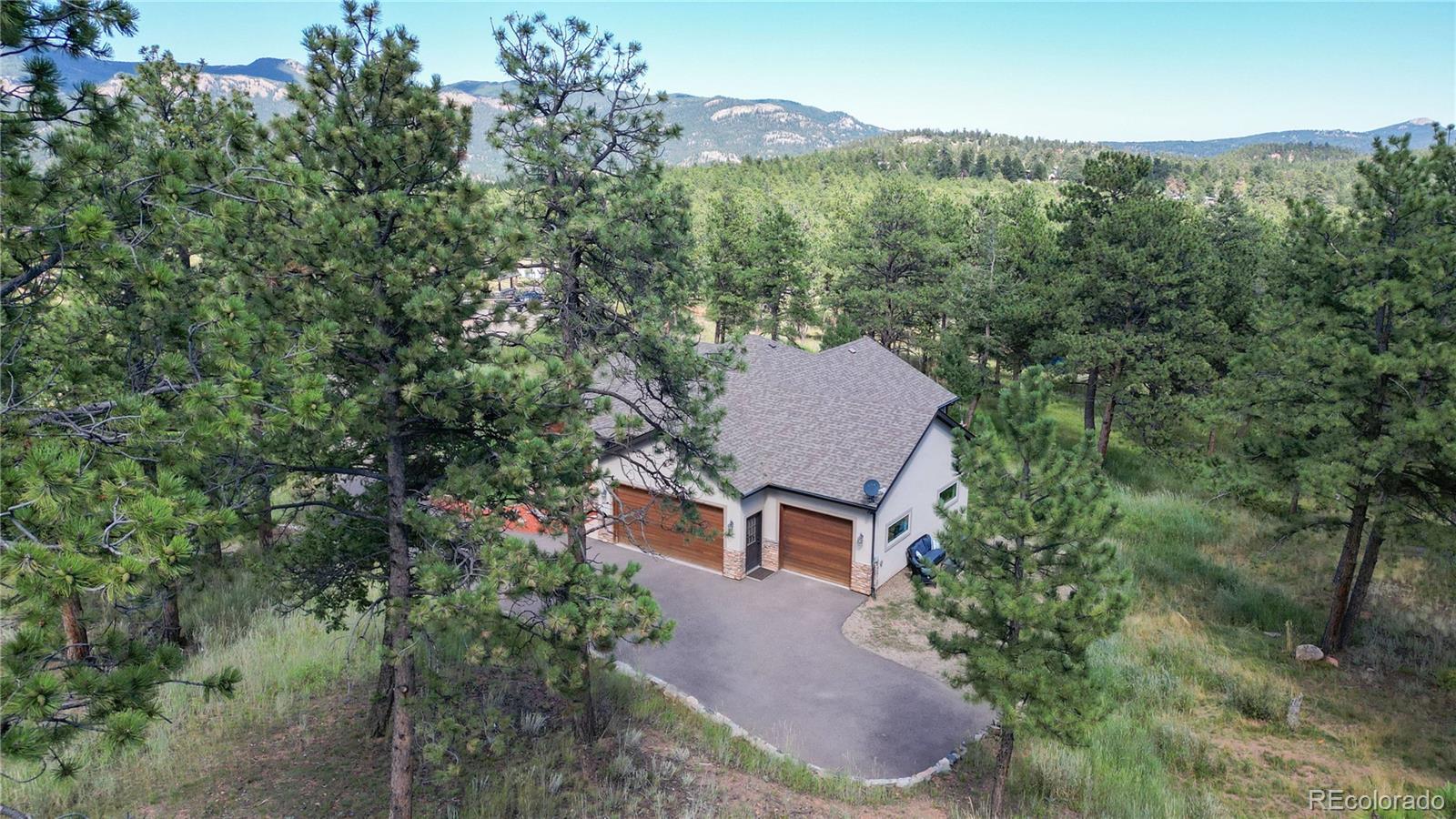230 Mohawk Trail Pine, CO 80470 - Photo 39 of 39 an aerial view of a house