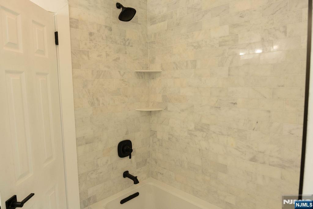 78 Poplar Avenue Little Ferry, NJ 07643 - Photo 7 of 23 a bathroom with a shower
