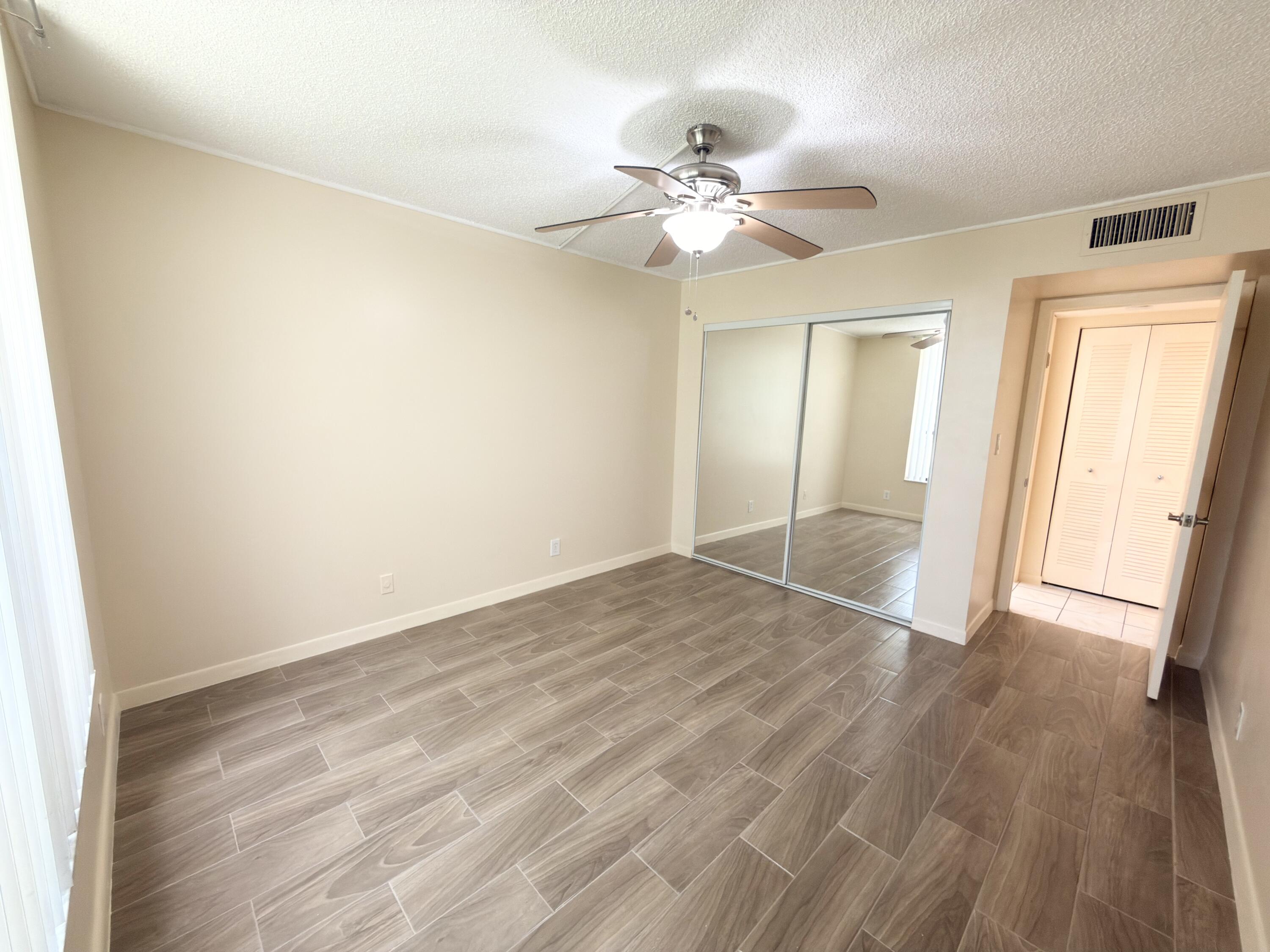 7650 West McNab Road, Unit 210 Tamarac, FL 33321 - Photo 4 of 13 Guest Bedroom