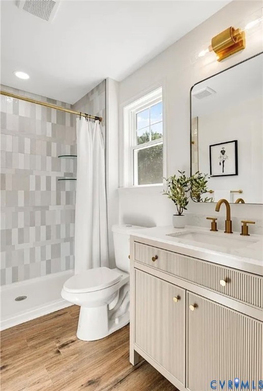 14915 Lebanon Road Spring Grove, VA 23881 - Photo 5 of 6 a bathroom with a sink a toilet and shower