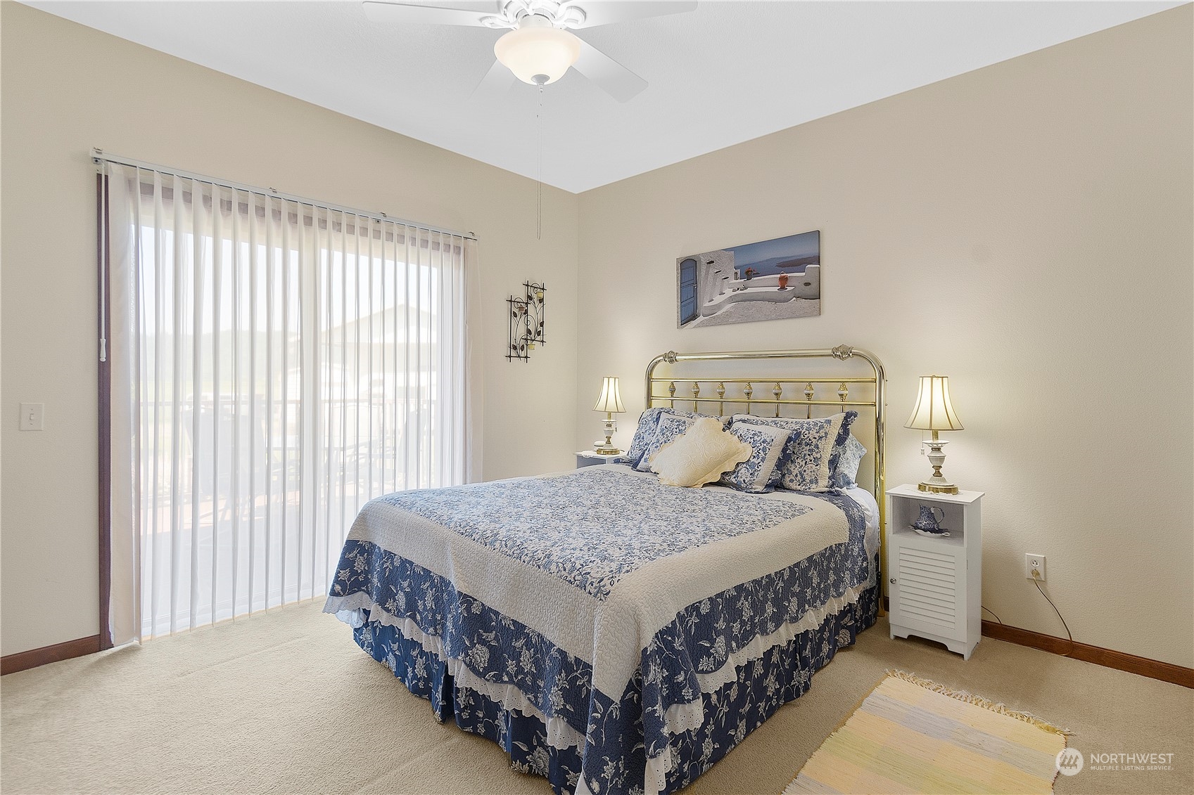 285 West Birnie Slough Road Cathlamet, WA 98612 - Photo 20 of 40 a bedroom with a bed and a window
