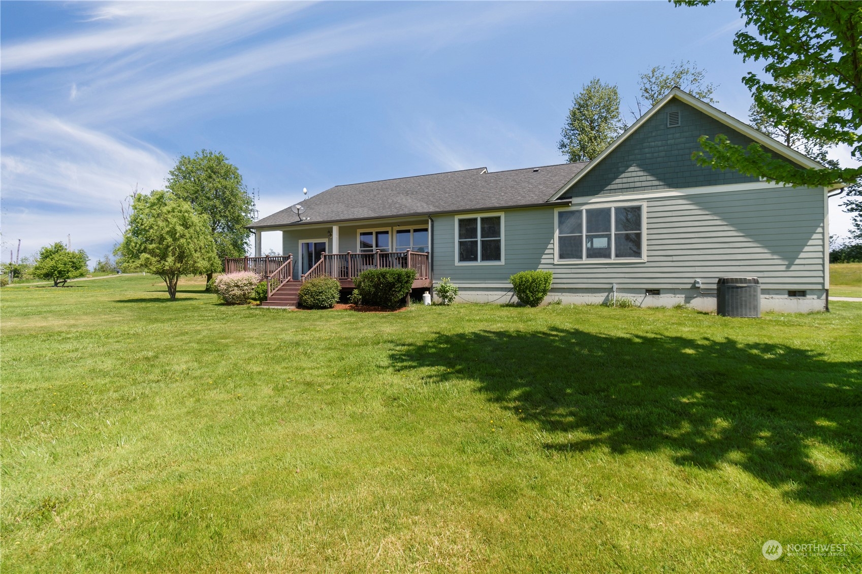 285 West Birnie Slough Road Cathlamet, WA 98612 - Photo 2 of 40 a front view of house with yard and green space