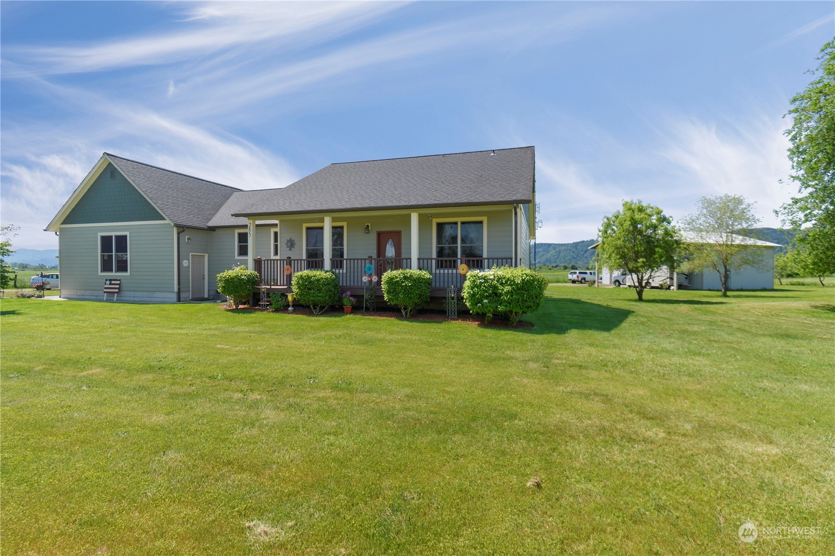 285 West Birnie Slough Road Cathlamet, WA 98612 - Photo 27 of 40 a front view of house with yard and green space