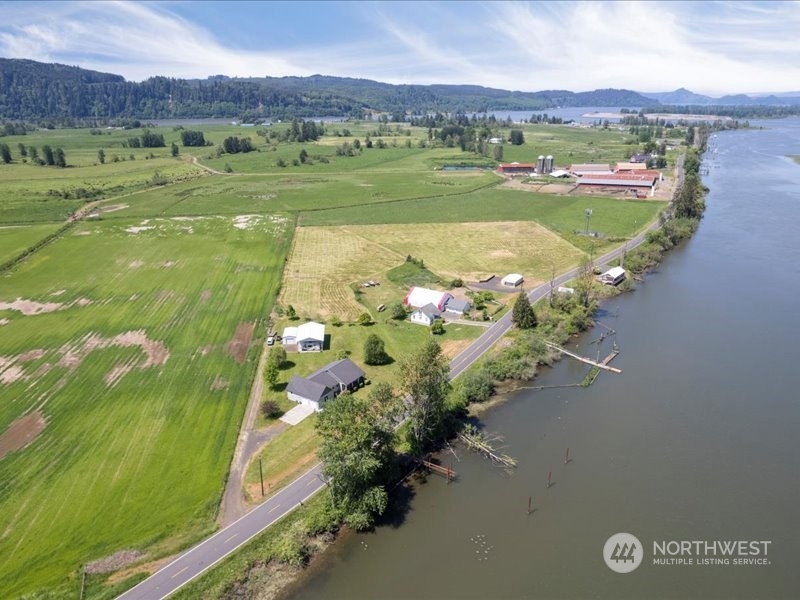 285 West Birnie Slough Road Cathlamet, WA 98612 - Photo 36 of 40 a view of a lake with a mountain
