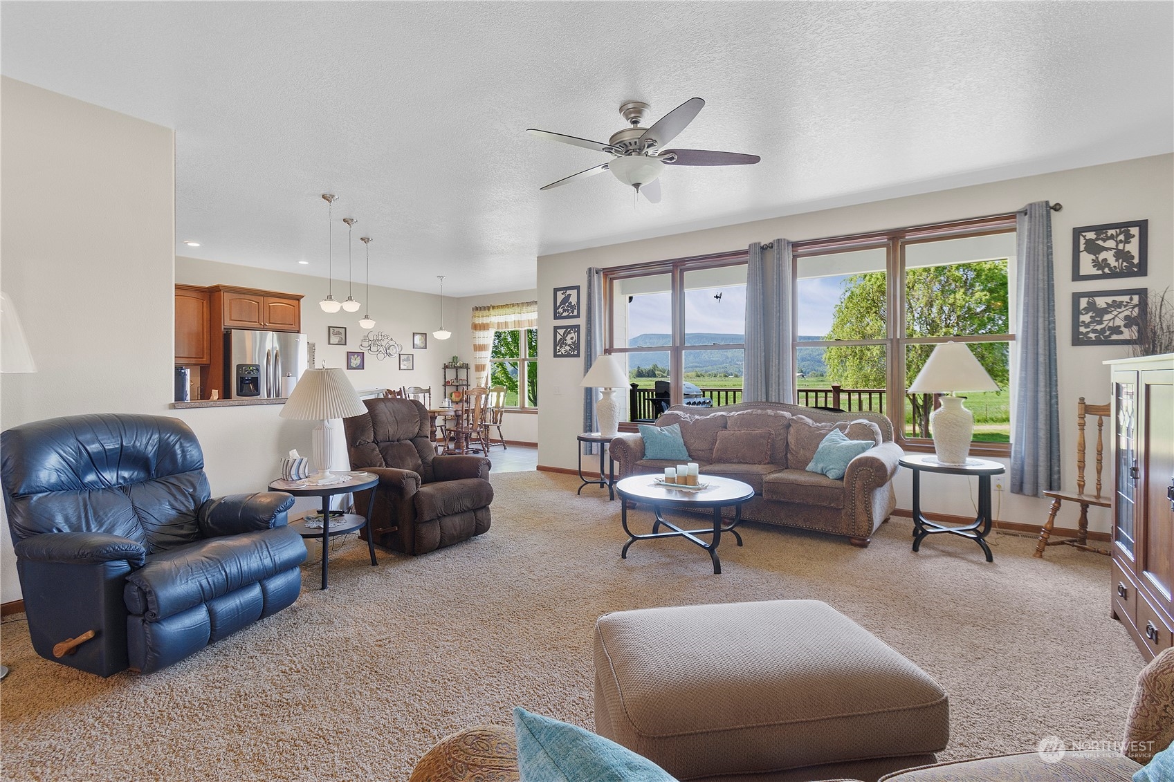 285 West Birnie Slough Road Cathlamet, WA 98612 - Photo 8 of 40 a living room with furniture and a large window