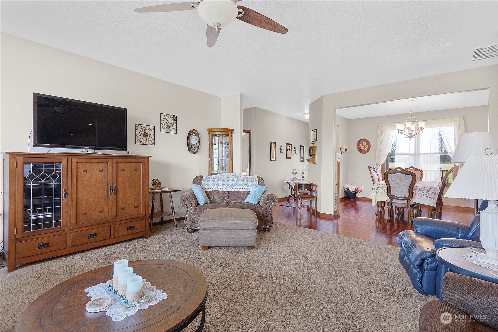 285 West Birnie Slough Road Cathlamet, WA 98612 - Photo 9 of 40 a living room with furniture and a flat screen tv