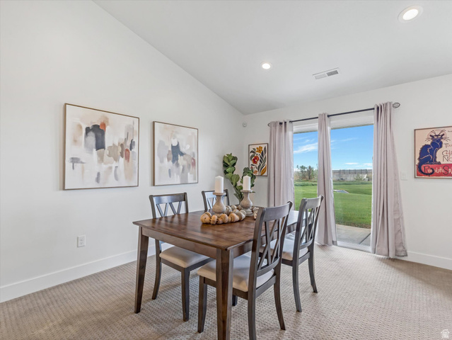 1278 South Grace Way Layton, UT 84041 - Photo 2 of 23 Dining area featuring a vaulted ceiling with recessed lighting, carpet flooring, and a sliding glass door providing exterior access