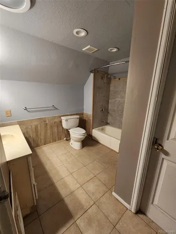 a bathroom with a sink and toilet