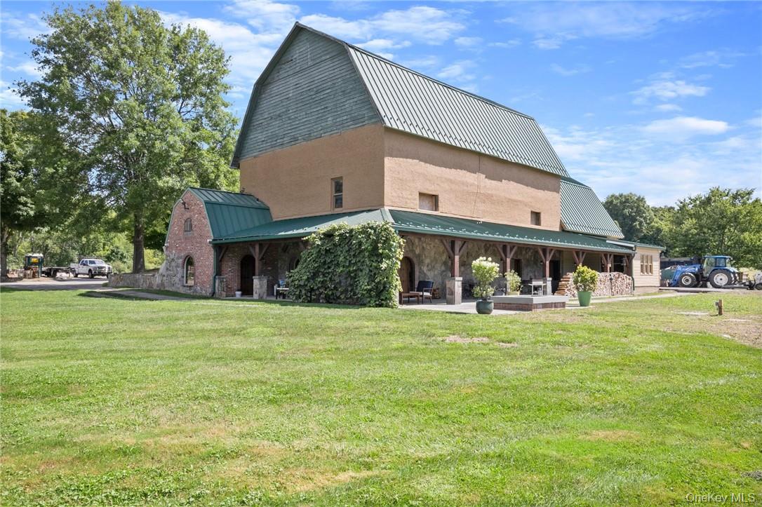 55 Daley Road Poughkeepsie, NY 12603 - Photo 2 of 38 a view of a house with a yard and sitting area