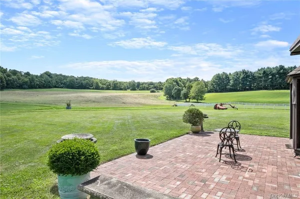 a view of a lake with a yard
