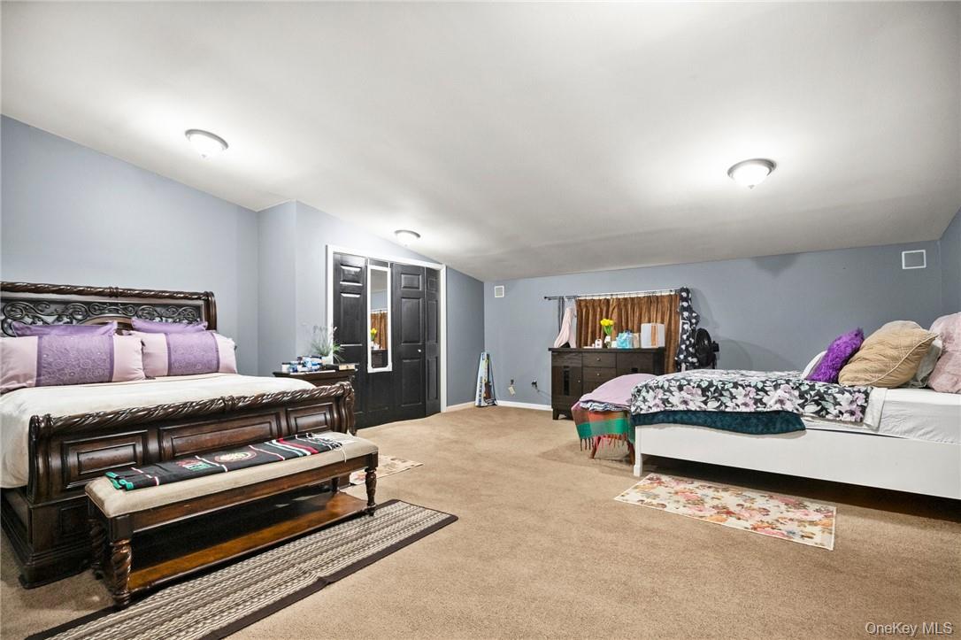 55 Daley Road Poughkeepsie, NY 12603 - Photo 33 of 38 a bedroom with furniture and wooden floor