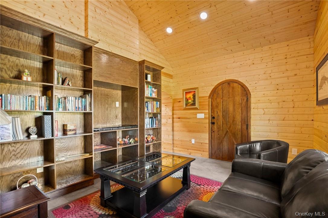 55 Daley Road Poughkeepsie, NY 12603 - Photo 10 of 38 a living room with furniture and a window