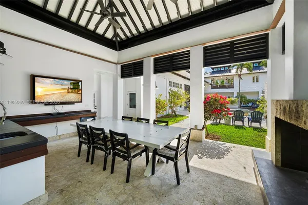 a kitchen with appliances cabinets a sink and a stove