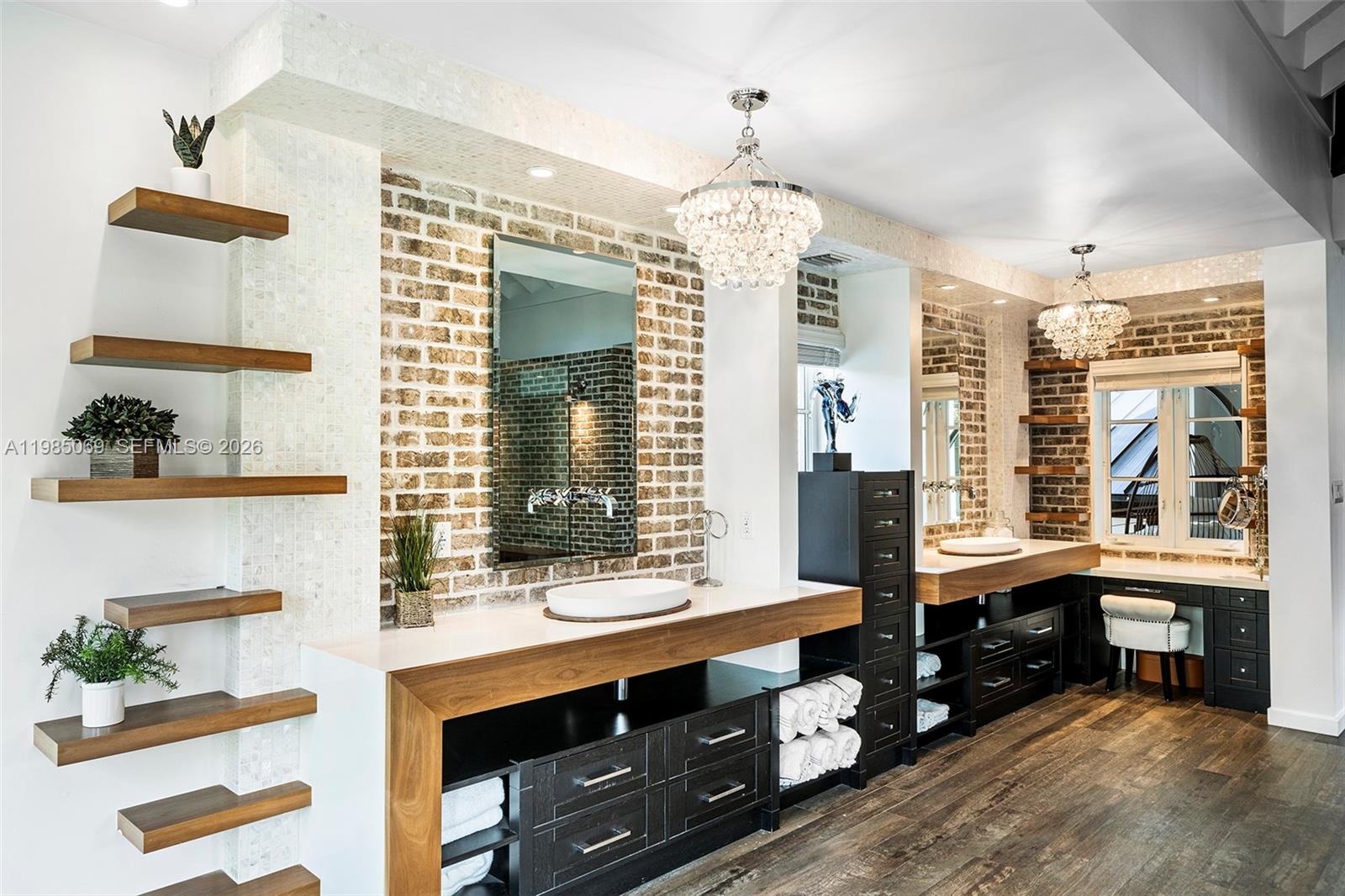 6700 Southwest 132nd Street Pinecrest, FL 33156 - Photo 41 of 99 a spacious bathroom with double vanity and a mirror
