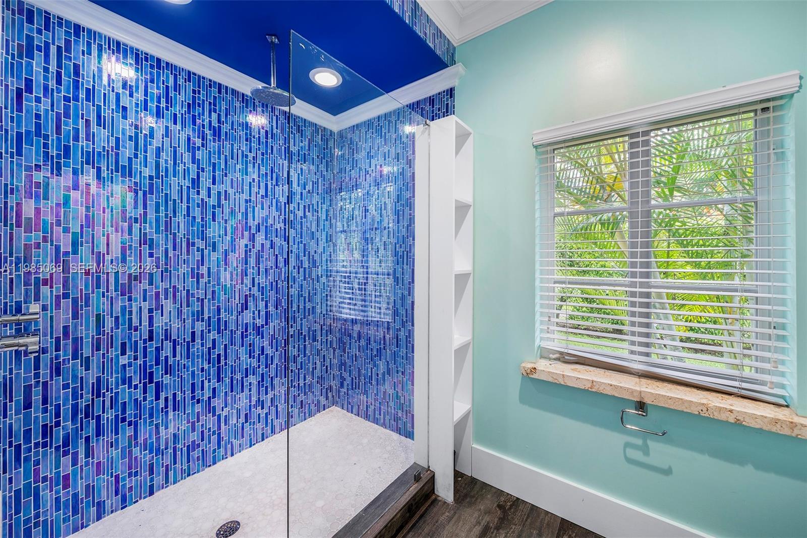 6700 Southwest 132nd Street Pinecrest, FL 33156 - Photo 51 of 99 a bathroom with a bathtub and shower