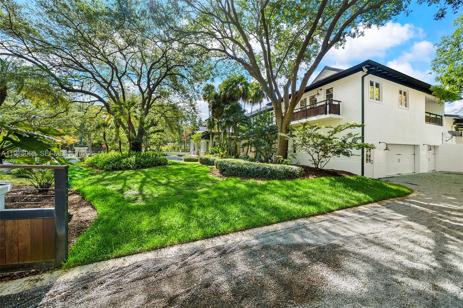 6700 Southwest 132nd Street Pinecrest, FL 33156 - Photo 90 of 99 Double gated entry and driveway to 2 car garage